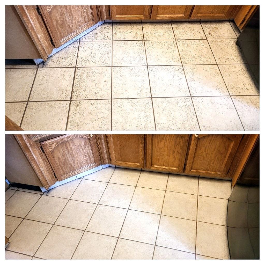 Clean vinyl and tile floor with a wood transition